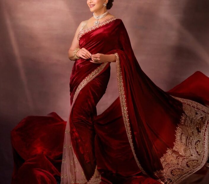 Madhuri Dixit in Red Velvet Saree and Pearl Choker, Exuding Old Bollywood Glamour